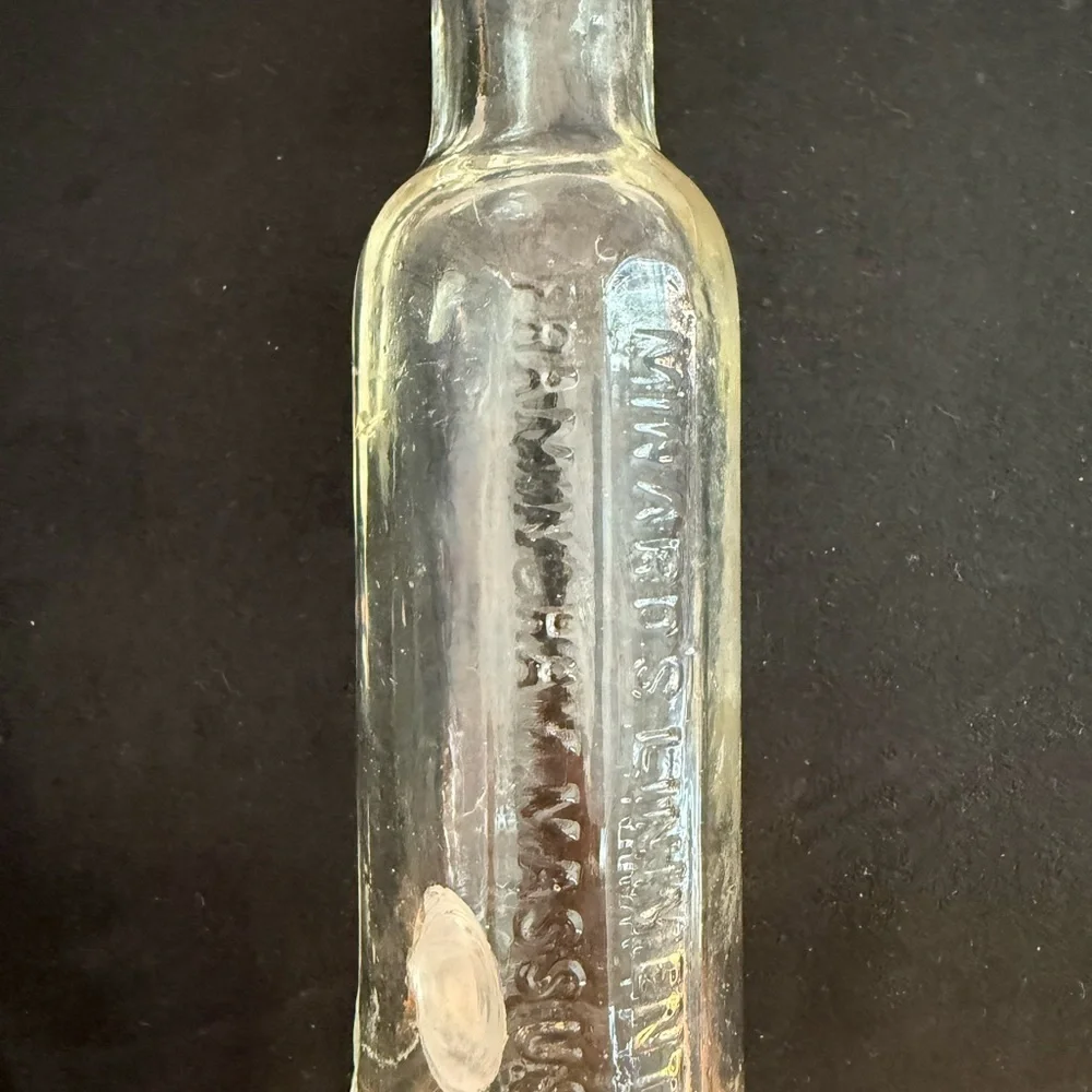 Minnard’s Linniment Embossed Glass Bottle 5 inches ANTIQUE